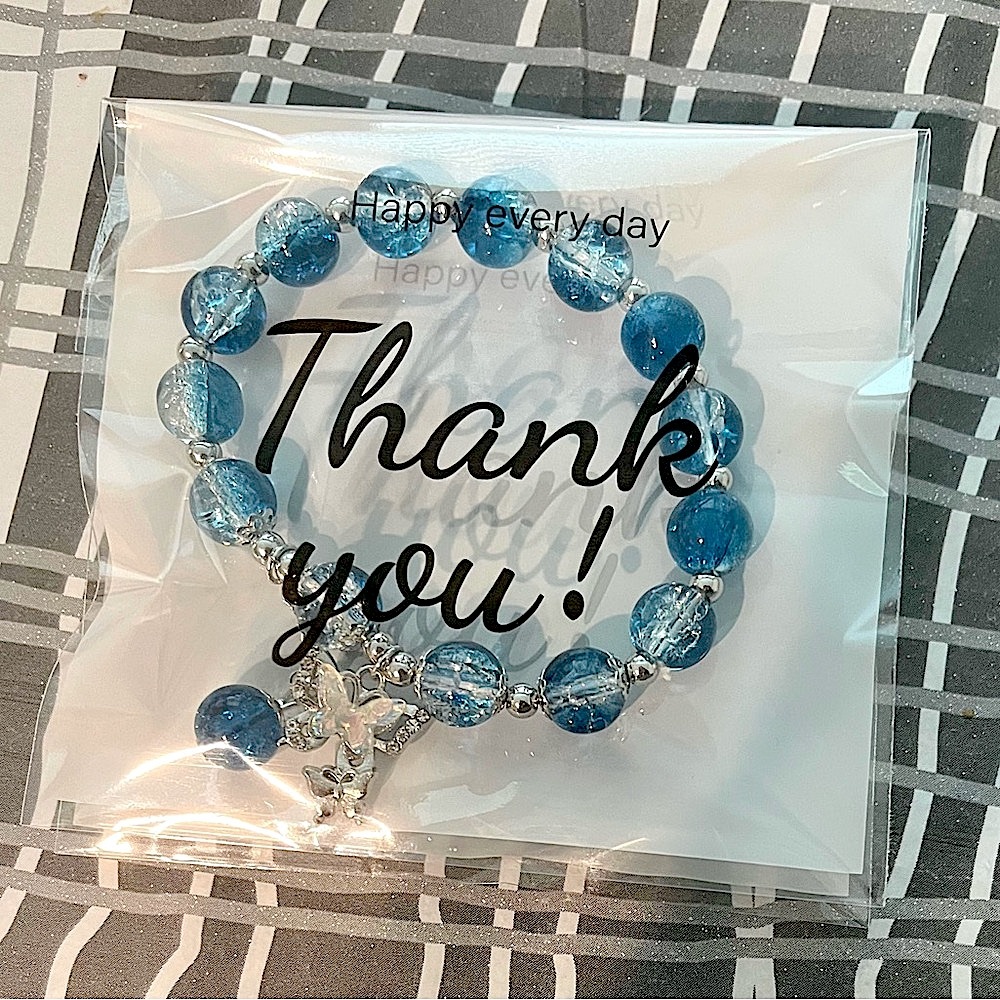 Blue Beaded Bracelet with Silver Charm